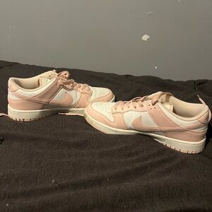 Nike pink and white shoes
